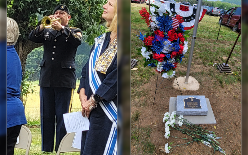 Staff Sergeant Dustin Felan of the 135th Army Band and St. James School Choir Director played Taps once Lt. Col. Benjamin Harrison's marker was unveiled.