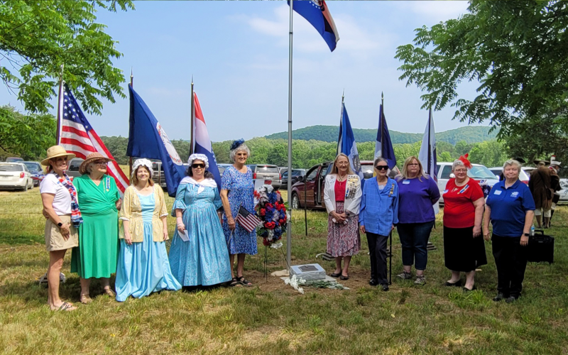 The Noah Coleman Chapter of the National Society of Daughters of the American Revolution (NSDAR) organized the event and placed the grave marker.